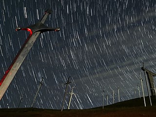 A view shows stars and meteor trails in the night sky above the Battle of Didgori memorial complex during the Lyrid meteor shower in Didgori, Georgia in this composite image of 28 separate photographs. File photo taken on April 22, 2023.