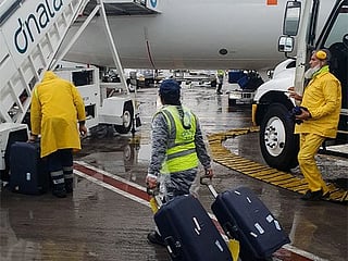 Residents and employees went about their daily duties at Dubai airport. 