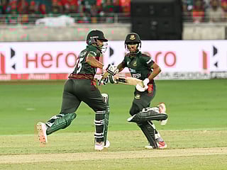 Bangladesh batsmen Shakib Al Hasan and Mehidy Hasan Miraz during their second wicket partnership against Sri Lanka in the DP World Asia Cup match at Dubai International Stadium. 