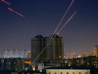 Tracers are seen in the night sky as Ukrainian servicemen fire on the drone as Russia's attack on Ukraine continues, in Kyiv. File photo.