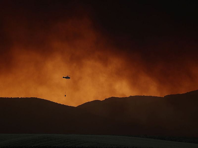 The blaze broke out in the rural province of Lleida. It created an enormous thick plume of ash and smoke that reached 14,000 meters (45,000 feet) of altitude, making it the largest registered by firefighters in Catalonia, a northeastern region of Spain. Illustrative image.