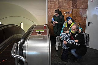 A family takes shelter in a metro station in Kyiv. 