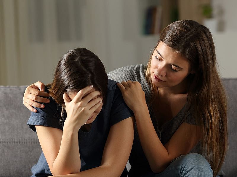 One woman crying