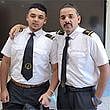 Batchmates in arms: Suleiman Mahmood, right, with his son Hashir Suleiman.
