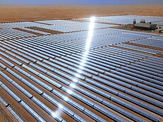 VERSATILE, FLEXIBLE, DISTRIBUTED POWER: Solar power can be used to generate electricity in a variety of settings, from large-scale solar farms to small rooftop installations. This versatility makes it a practical option for a wide range of applications, including residential, commercial, and industrial use. A view of the Shams solar power project in Abu Dhabi.