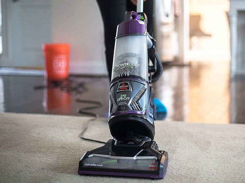 Person vacuuming