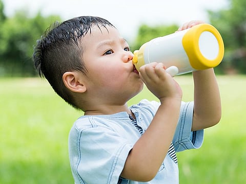 Along with gadgets like stroller fans, lightweight clothing, sunscreen, good ventilation in strollers, and adequate hydration all help keep babies and toddlers cool and protected outdoors.