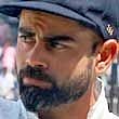 Indian skipper Virat Kohli gestures after winning the second Test against England at MA Chidambaram Stadium, in Chennai.