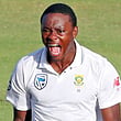 South Africa's Kagiso Rabada celebrates after taking the wicket of Australia’s Usman Khawaja.