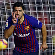 Barcelona’s Luis Suarez celebrates after scoring a goal against Rayo Vallecano in La Liga at the Vallecas
Stadium in Madrid on Saturday.