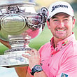 Graeme McDowell of Northern Ireland holds the trophy after
winning the French Open at Paris National on Sunday.