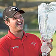 
Patrick Reed is all smiles as he holds the The Barclays trophy in Farmingdale, New York.