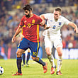 Diego Costa holds off Phil Jones