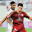 

Al Wahda’s Sebastian Tagliabue gets away from Al Ain’s Mohammad Ahmad during their match on Saturday night.