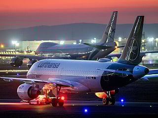 Lufthansa aircrafts are parked at the airport in Frankfurt. 