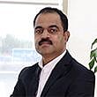 Jayan K.