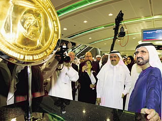 Sheikh Mohammed unveils a commemorative coin at DIFC station during the Dubai Metro's maiden journey. 

Since its first ride in 2009, it has carried billions of passengers, set world records, and expanded into one of the most advanced driverless metro networks in the world.