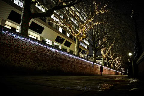 London: UK families of some 240,000 people who died from Covid-19 have hung festive lights on a London wall, a symbol of love, anger and pain ahead of another Christmas overshadowed by loss.