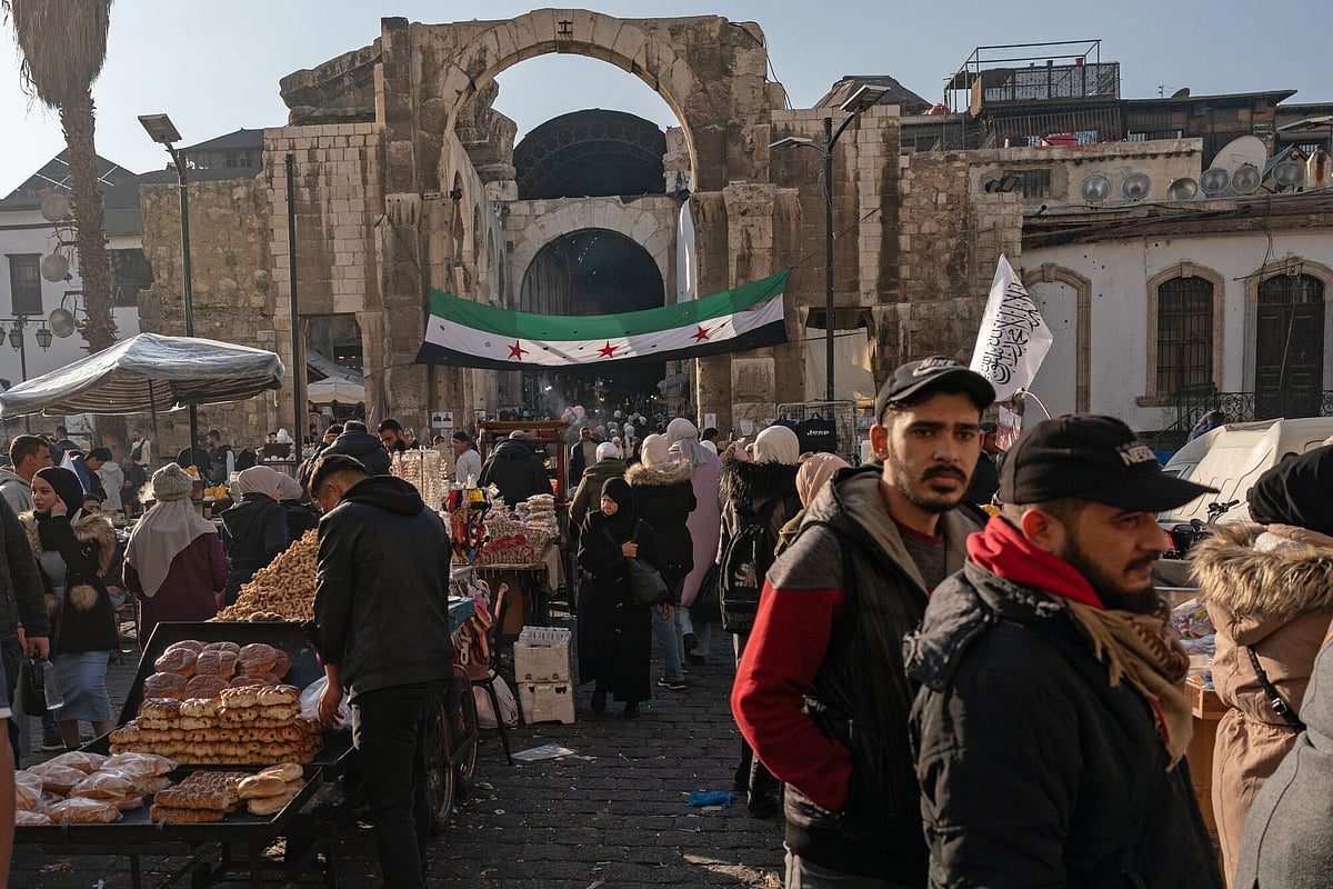 Shoppers at an outdoor market beside the Umayyad Mosque in Damascus, Syria