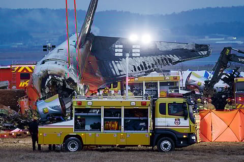 The wreckage of Jeju Air Co. Flight 2216 at Muan International Airport in Muan County, South Korea