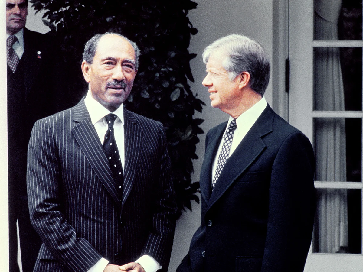 Egyptian President Anwar Sadat (L) and US President Jimmy Carter (R) meet prior to talks on the Mideast situation, on April 08, 1980 in Washington DC. 