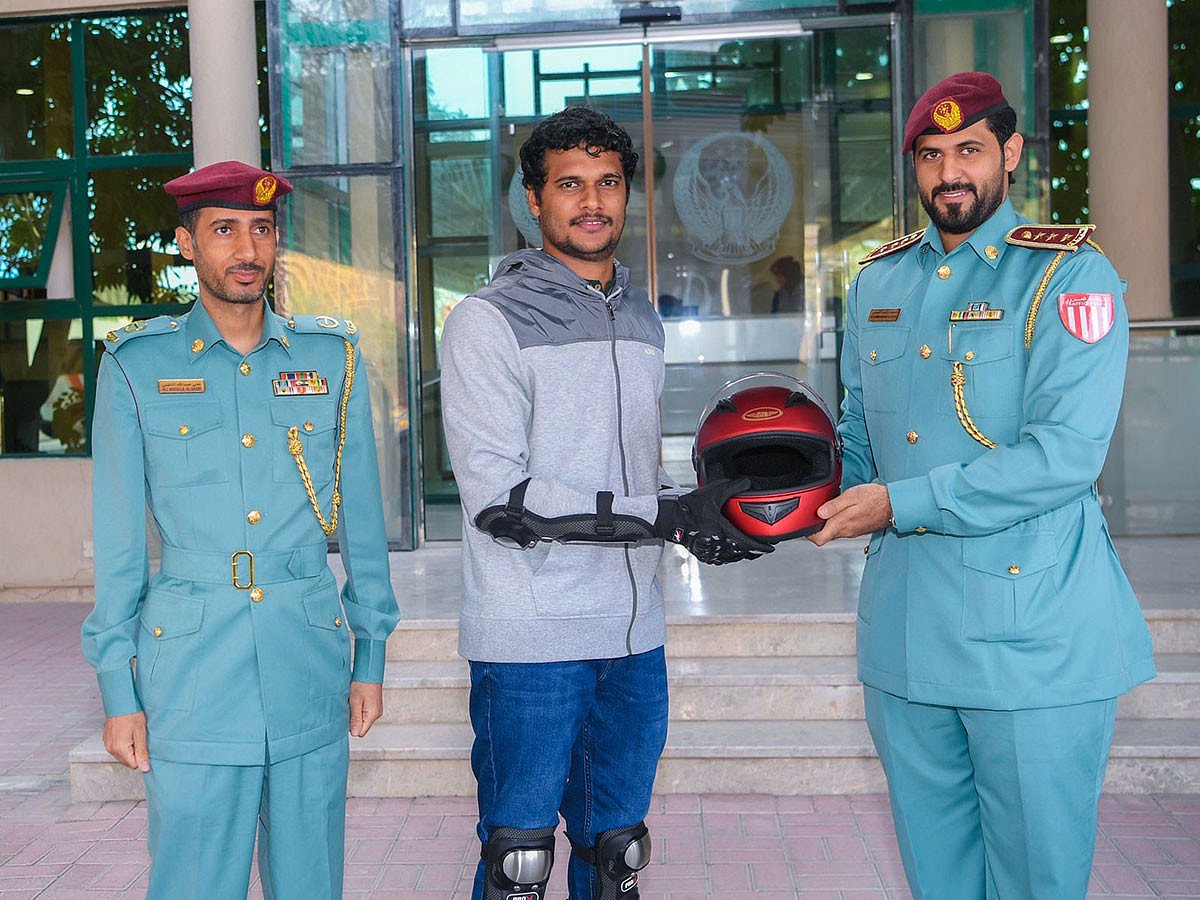 Ras Al Khaimah Police distribute helmets to bikers as part of the road safety campaign