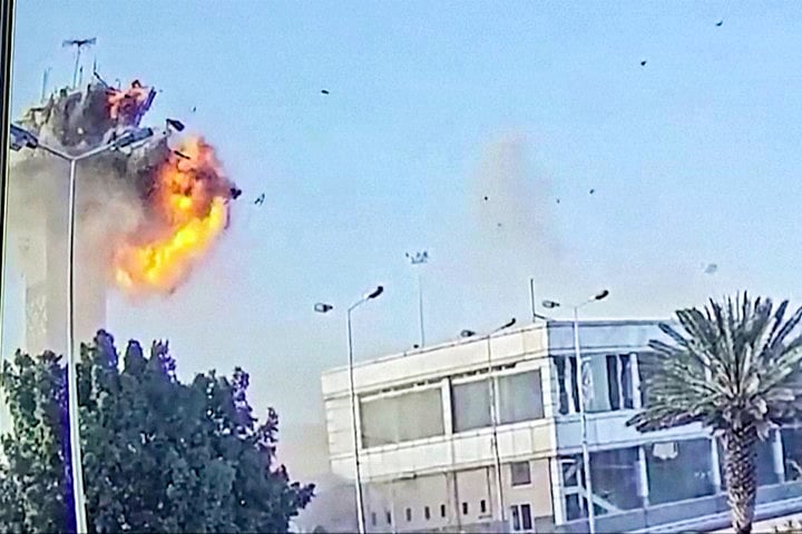 This grab taken from footage released by Al Masirah TV station of Yemen's Huthis on December 28, 2024 shows the moment an Israeli strike hit the control tower of Sanaa International Airport.  