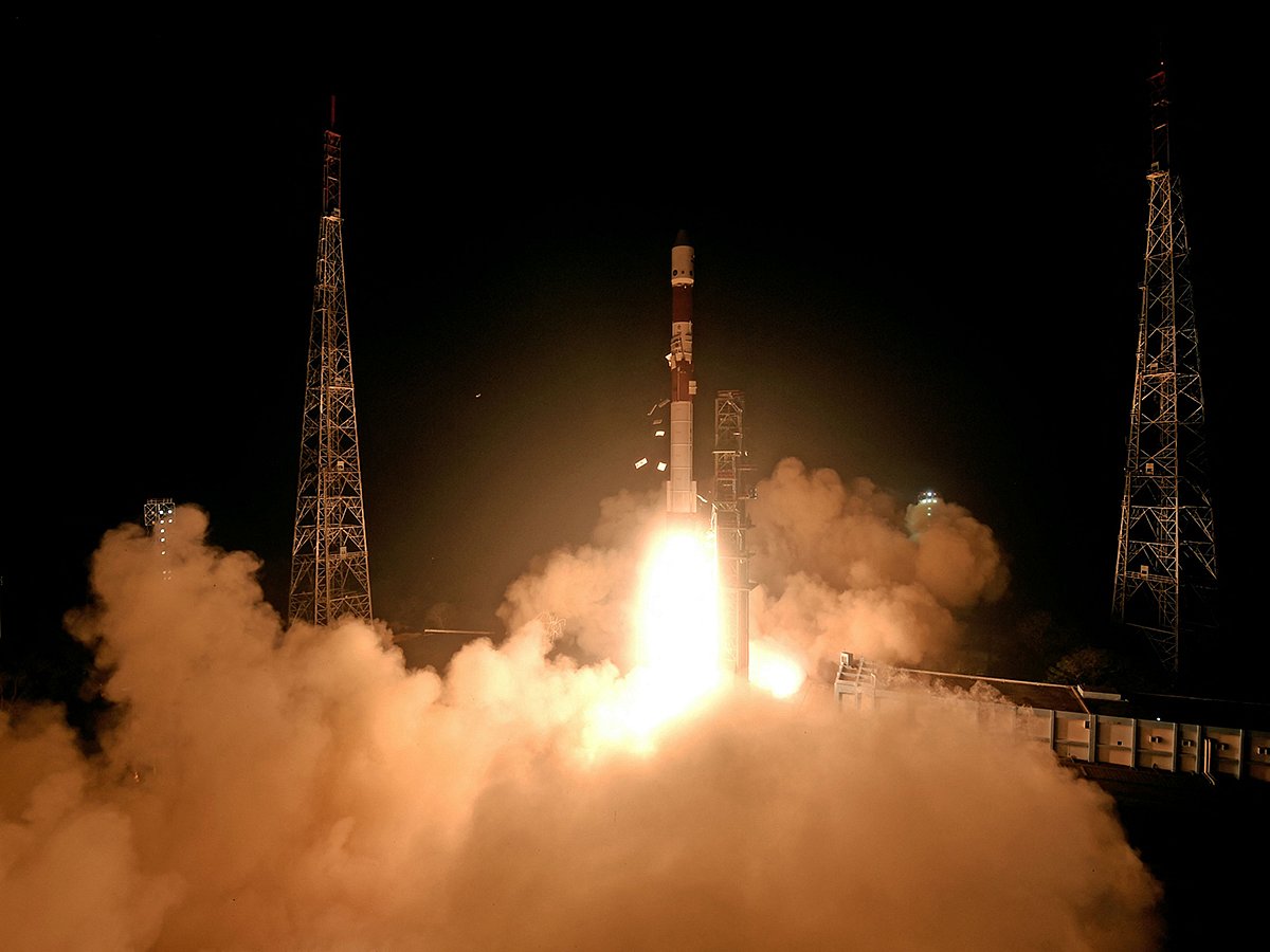 This handout photograph taken and released  on December 30, 2024 by the Indian Space Research Organisation (ISRO) shows the launch of the ISRO PSLV-C60 rocket carrying two SpaDeX satellites SDX01 (Chaser) and SDX02 (Target) from the Satish Dhawan Space Centre in Sriharikota.