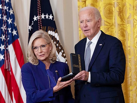 Former Congresswoman Liz Cheney receives the Presidential Citizens Medal from US President Joe Biden during a ceremony at the White House in Washington, DC, on January 2, 2025. 