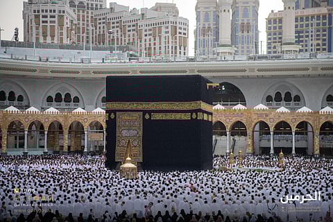 Pilgrims and worshippers throng the courtyard of the Grand Mosque, home to the Holy Kaaba. 