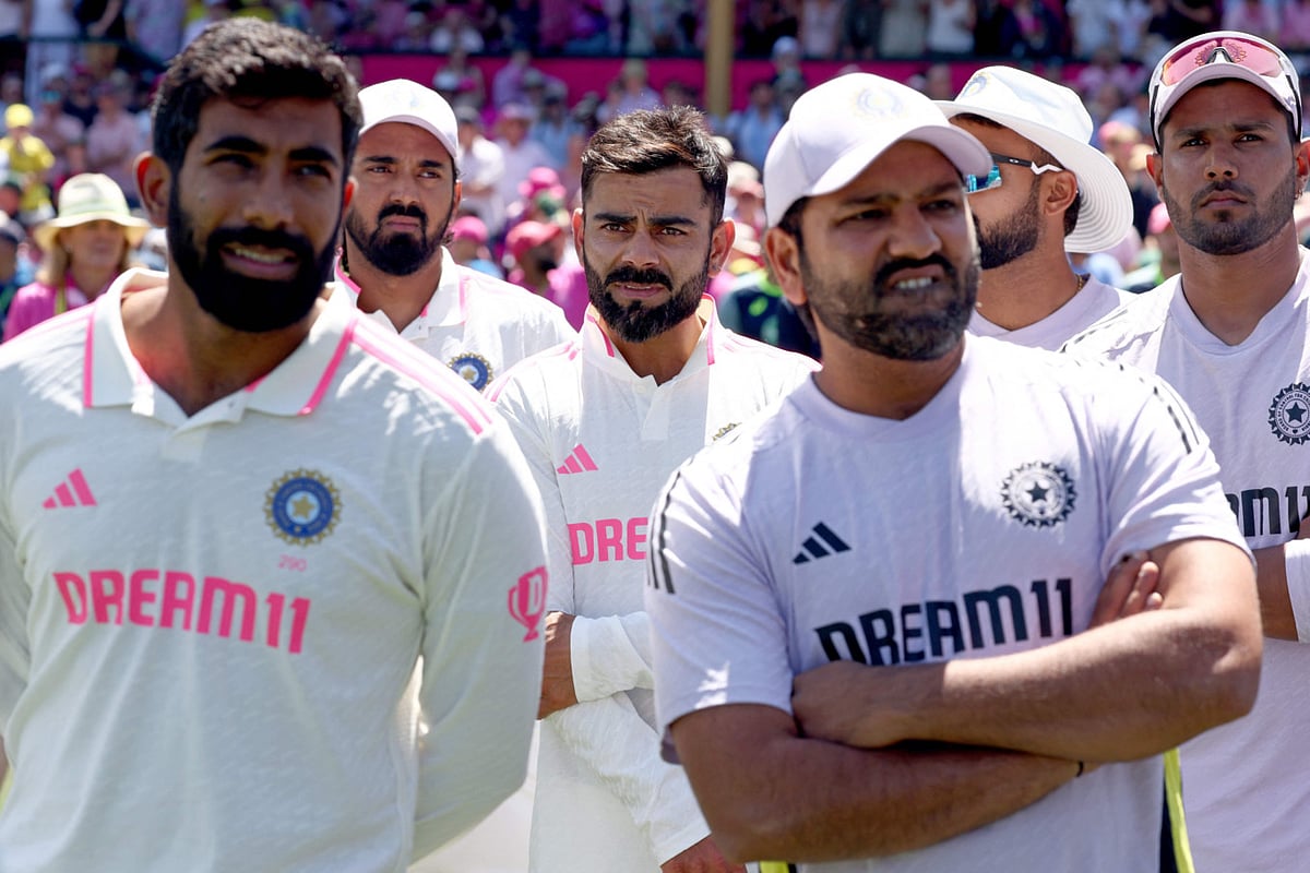 Indian players watch during the trophy ceremony after the fifth cricket Test match against Australia at The SCG in Sydney on Sunday.