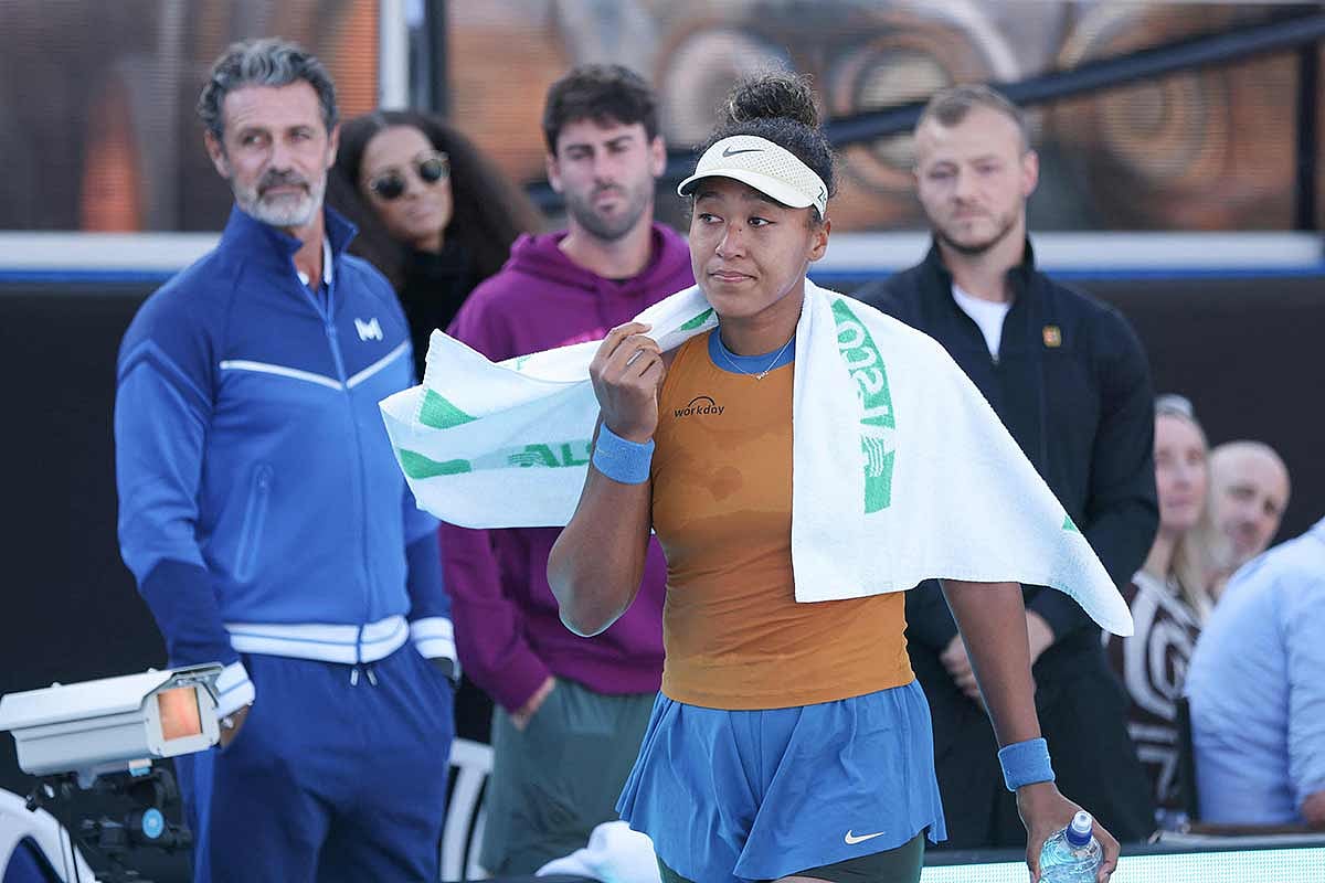 Naomi Osaka of Japan reacts after withdrawing against Clara Tauson of Denmark from their women's singles final match at the WTA Auckland Classic tennis tournament in Auckland on January 5, 2025. 
