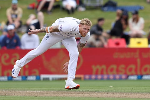 Englands Ben Stokes bowls on day three of the third cricket Test match against New Zealand and England at Seddon Park in Hamilton on December 16.