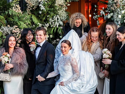 Magnus Carlsen and Ella Victoria Malone outside Holmenkollen Chapel in Oslo after the wedding ceremony.