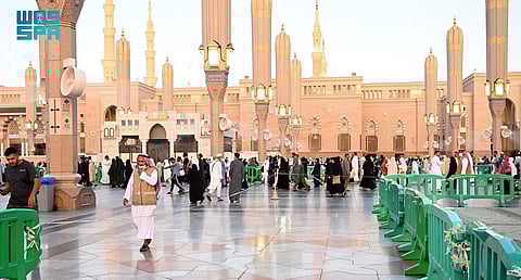 Worshippers head to the Prophet's Mosque in Medina. 