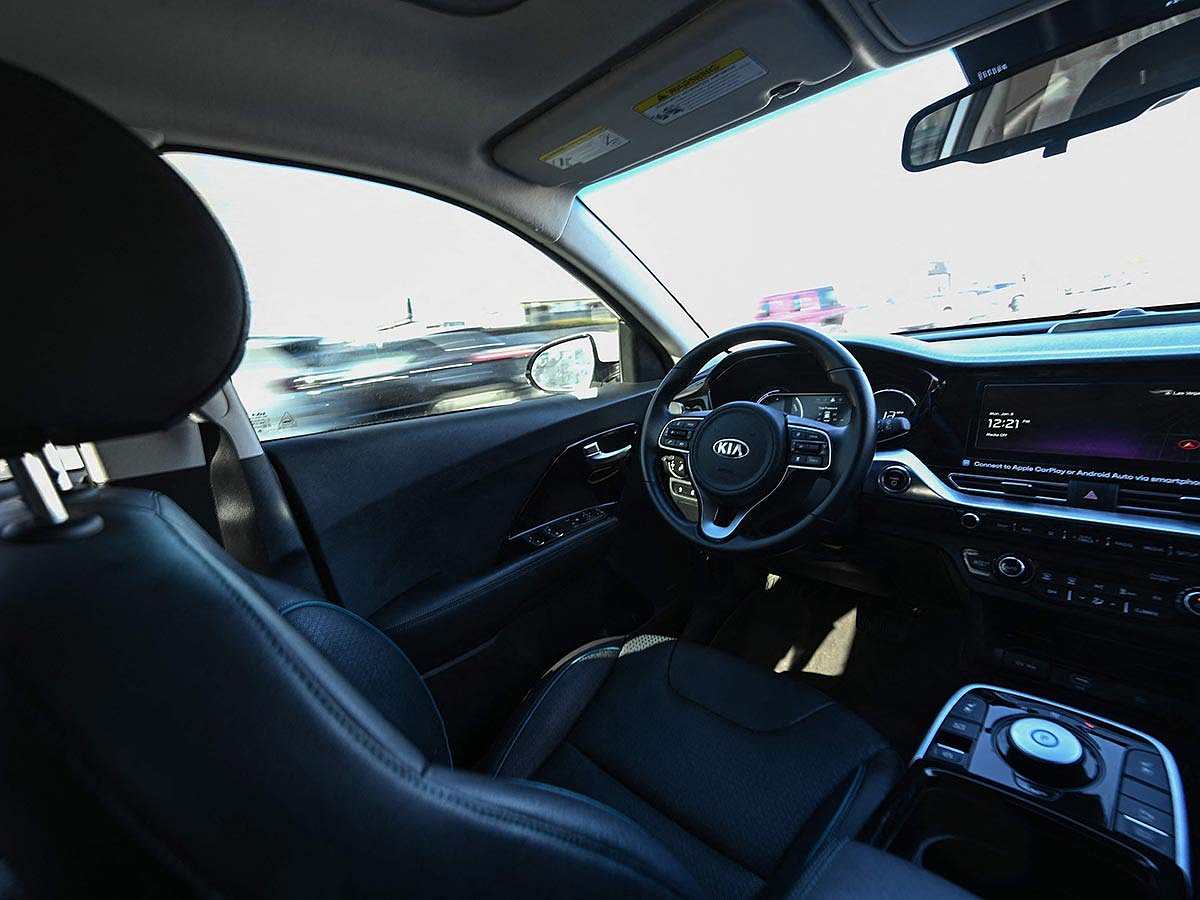 A Kia Vay remote-drive electric vehicle cruises during a live demonstration of remote driving on city streets ahead of the Consumer Electronics Show (CES) in Las Vegas, Nevada, on January 6, 2025. 
