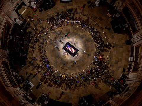 A military guard of honor stands next to the flag-draped casket of former US President Jimmy Carter during the Lying in State Ceremony at the US Capitol Rotunda in Washington, DC on January 7, 2025. 