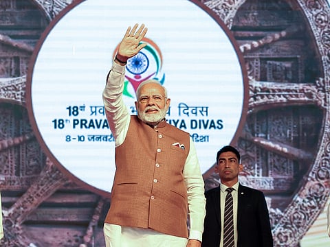 India's Prime Minister Narendra Modi waves to the gathering during the inauguration of the 18th Pravasi Bharatiya Divas Convention, in Bhubaneswar on Thursday, January 9, 2025. 