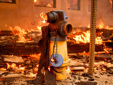 A fire hydrant burns during the Eaton fire in the Altadena area of Los Angeles county.