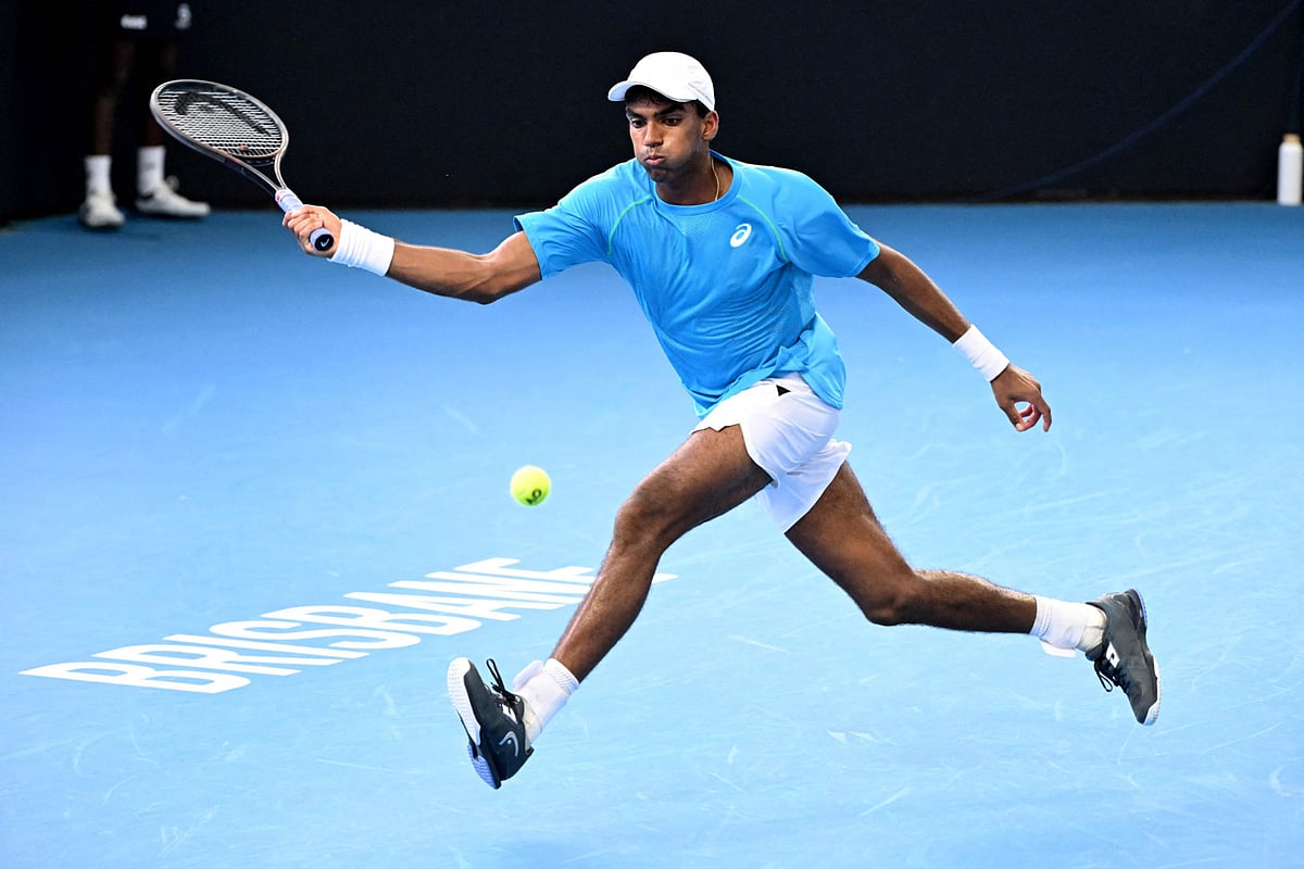 Nishesh Basavareddy of the US hits a return during his loss to Gael Monfils in Brisbane last week. The Indian-American teenager will meet Novak Djokovic in the Australian Open first round.