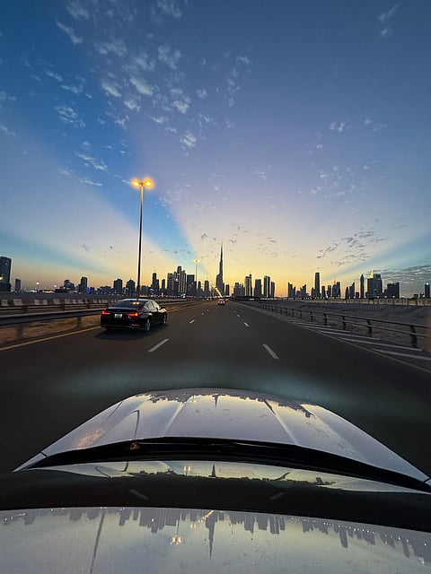 "Dubai at dusk: A breathtaking skyline"
-
Fauwad Taha Qureshi, a Pakistani expat who grew up in the UAE, captured this photo of Dubai’s skyline at sunset, with the Burj Khalifa and other iconic buildings silhouetted against vibrant orange and blue hues.
Below, the impeccably maintained roads reflect the UAE’s dedication to world-class infrastructure and a seamless driving experience, says the 25-year-old engineer.
