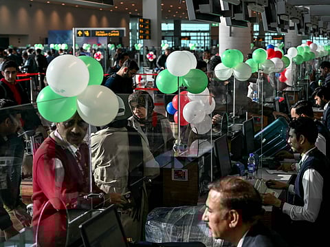 Passengers wait at the immigration counter before boarding their first flight to Paris at the Islamabad International Airport on January 10, 2025, as EU authorities lift a four-year ban.