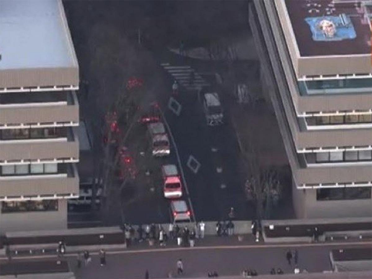 NHK and other media outlets said the attacker, a woman sociology student, had swung a hammer during a class.