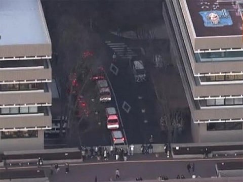 NHK and other media outlets said the attacker, a woman sociology student, had swung a hammer during a class.