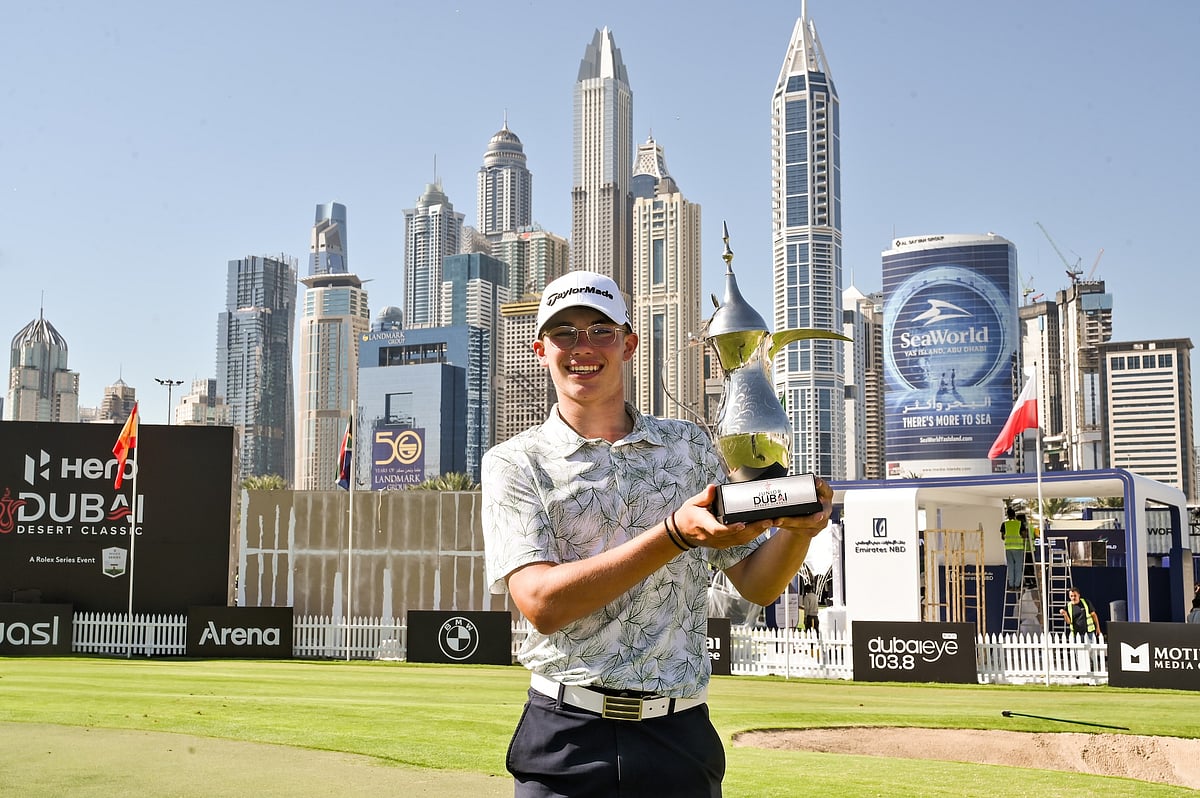 Louis Klein of Czechia with the Junior Dubai Desert Classic trophy at Emirates Golf Club.