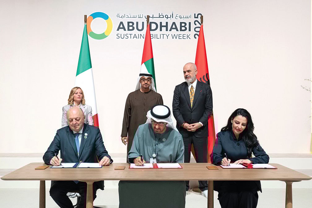 His Highness Sheikh Mohamed bin Zayed Al Nahyan, President of the United Arab Emirates (back C); Giorgia Meloni, Prime Minister of Italy (back L); and Edi Rama, Prime Minister of Albania (back R), at the signing ceremony during Abu Dhabi Sustainability Week at ADNEC. Seen signing on behalf of the UAE, Dr Sultan bin Ahmed Al Jaber, UAE Minister of Industry and Advanced Technology, Group CEO of ADNOC and Chairman of Masdar (front C). On behalf of Albania, Belinda Balluku, Deputy Prime Minister and Minster of Infrastructure and Energy (front R). On behalf of Italy, Gilberto Pichetto Fratin, Minister of Environment and Energy Security (back L)