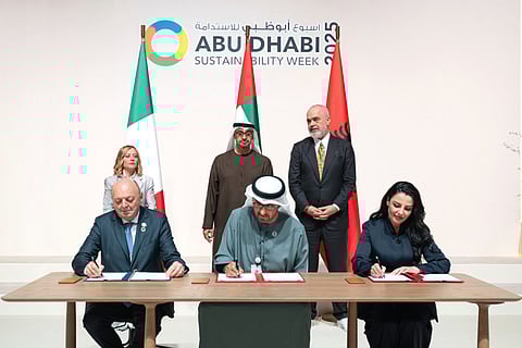 His Highness Sheikh Mohamed bin Zayed Al Nahyan, President of the United Arab Emirates (back C); Giorgia Meloni, Prime Minister of Italy (back L); and Edi Rama, Prime Minister of Albania (back R), at the signing ceremony during Abu Dhabi Sustainability Week at ADNEC. Seen signing on behalf of the UAE, Dr Sultan bin Ahmed Al Jaber, UAE Minister of Industry and Advanced Technology, Group CEO of ADNOC and Chairman of Masdar (front C). On behalf of Albania, Belinda Balluku, Deputy Prime Minister and Minster of Infrastructure and Energy (front R). On behalf of Italy, Gilberto Pichetto Fratin, Minister of Environment and Energy Security (back L)