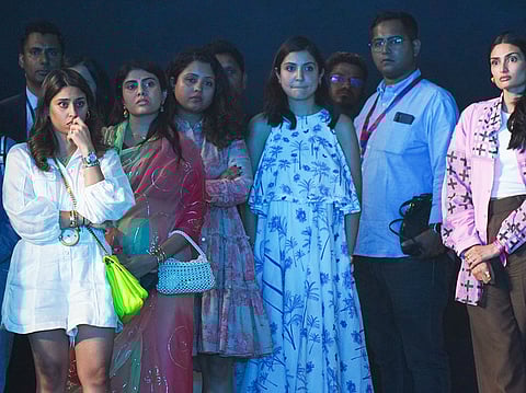Wives of Indian men's cricket team members during the post-match ceremony after Australia won the ICC Men's Cricket World Cup 2023 final match at the Narendra Modi Stadium, in Ahmedabad on Sunday, November 19, 2023. Ritika Sajdeh (wife of Rohit Sharma), Anushka Sharma (actress and wife of Virat Kohli), Ribava Jadeja (wife of Ravindra Jadeja), Prithi Narayanan (wife of Ravichandran Ashwin), and Athiya Shetty (actress and wife of KL Rahul) are seen in the photo. 