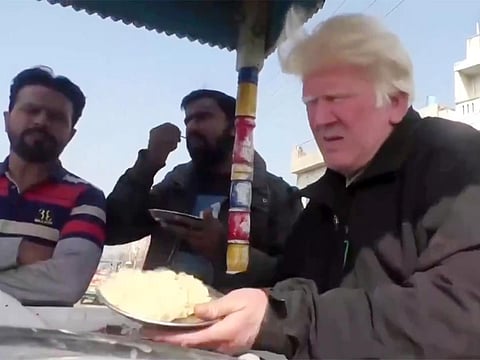 Saleem Bagga's (right) resemblance to Trump stems from his distinctive blond quiff, a result of his albinism.