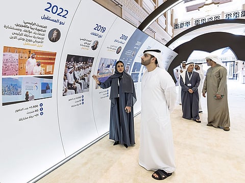 Sheikh Mansoor bin Mohammed bin Rashid Al Maktoum, Chairman of the Dubai Ports and Borders Security Council, stops by a mural chronicling the evolution of the Dubai International Project Management Forum (DIPMF) over the past decade (2014–2024), at Madinat Jumeirah. Seen behind him is Mattar Al Tayer, Director General and Chairman of the Board of Executive Directors of Dubai’s Roads and Transport Authority (RTA).
